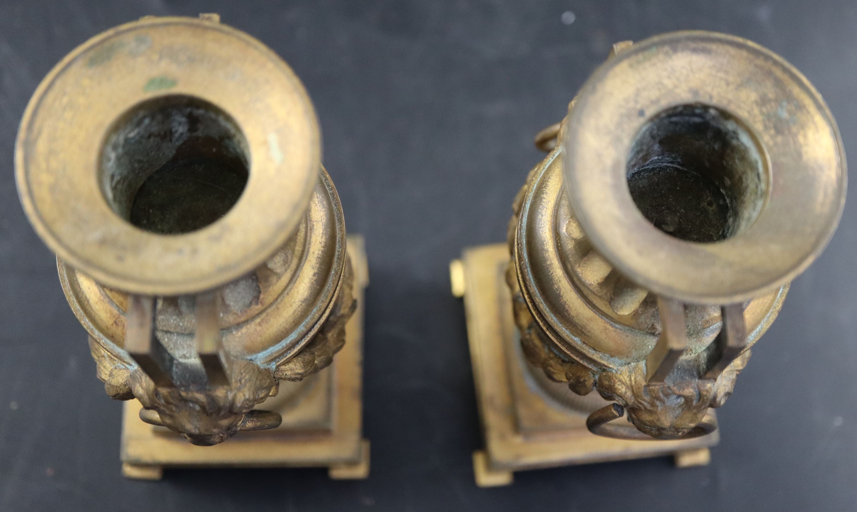 A pair of 19th century French ormolu urn shaped candlesticks, height 15cm